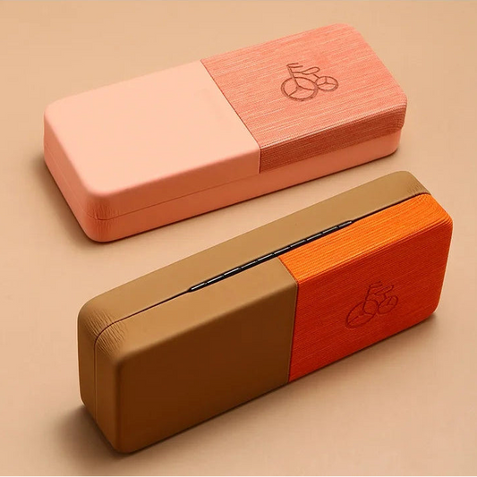 Two wooden blocks, one pink and one brown, on a beige background.