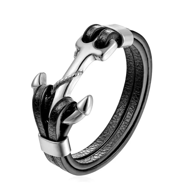 Silver and black leather ring on a white background