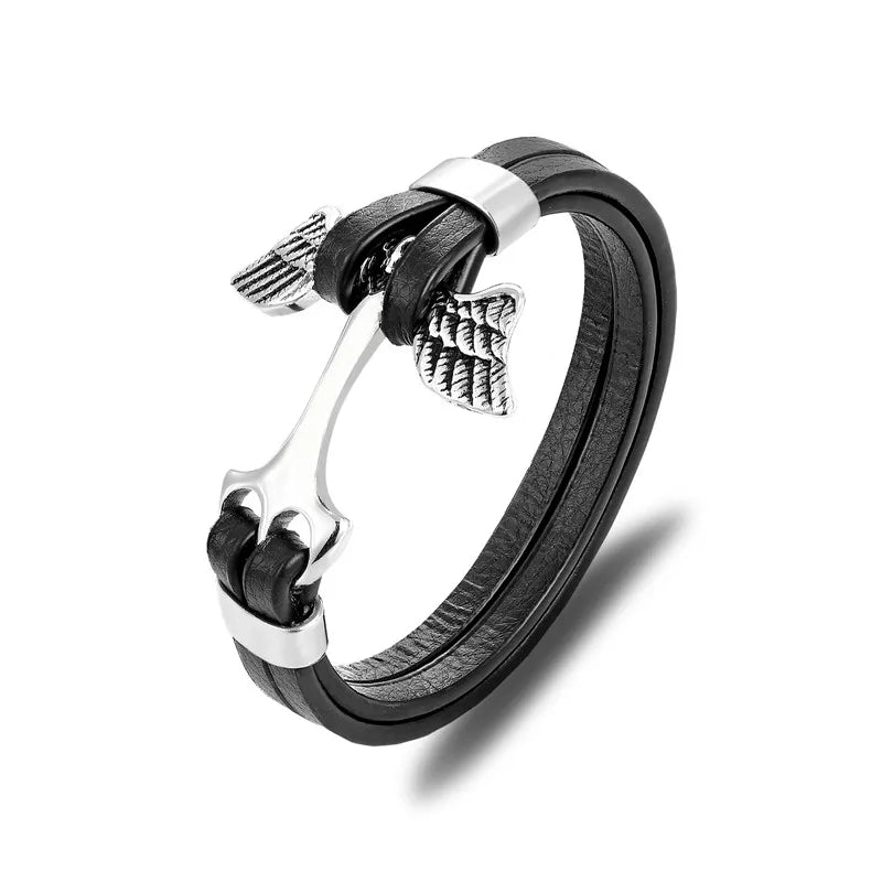 Black leather bracelet with silver metal elements on a white background