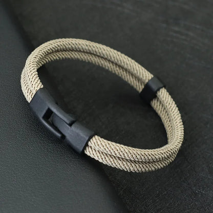Dual Weave Bracelet Represents the double layer intertwined with style and resistance