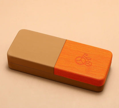 Two-tone brown and orange rectangular box with a logo on a beige background