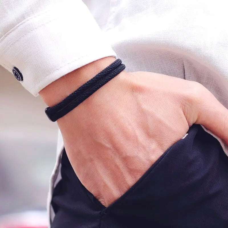 Dual Weave Bracelet Represents the double layer intertwined with style and resistance