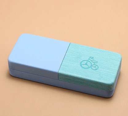 Two-tone blue and green rectangular object with a logo on a beige background