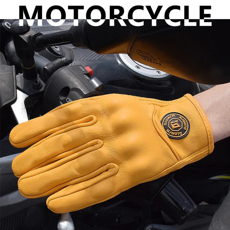Yellow motorcycle glove on a gloved hand against a motorcycle background