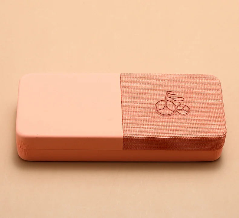 Pink yoga block with a logo on a beige background